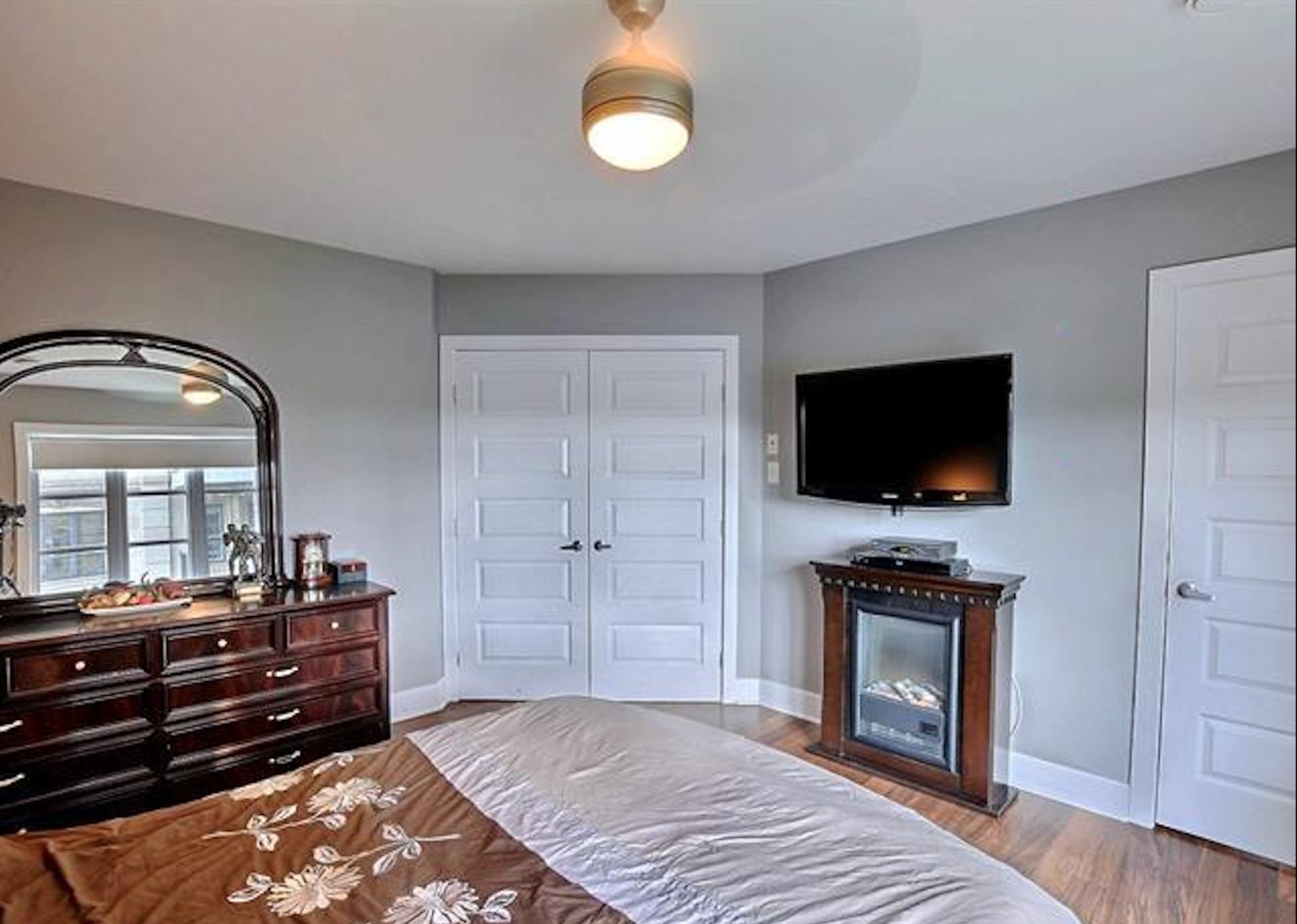 Master Bedroom - 205-65 Rue Des Manoirs, Charlemagne, QC - Indoor Photo Showing Bedroom With Fireplace