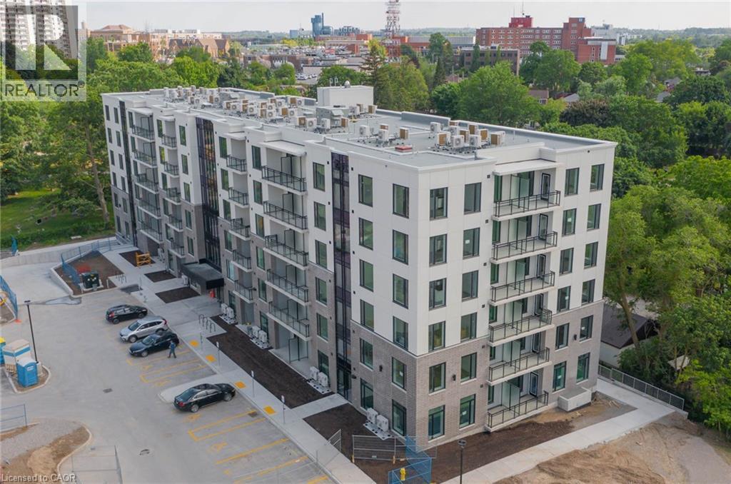 View of apartment building / complex with a city view - 103 Roger Street Unit# 310, Waterloo, ON - Outdoor