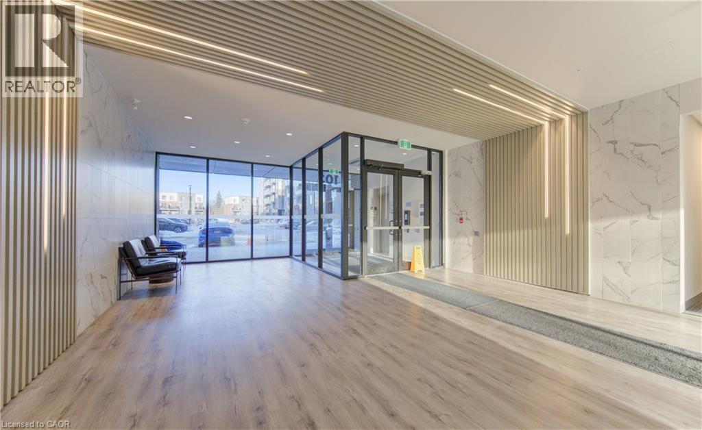 Building lobby featuring expansive windows - 103 Roger Street Unit# 310, Waterloo, ON - Indoor Photo Showing Other Room