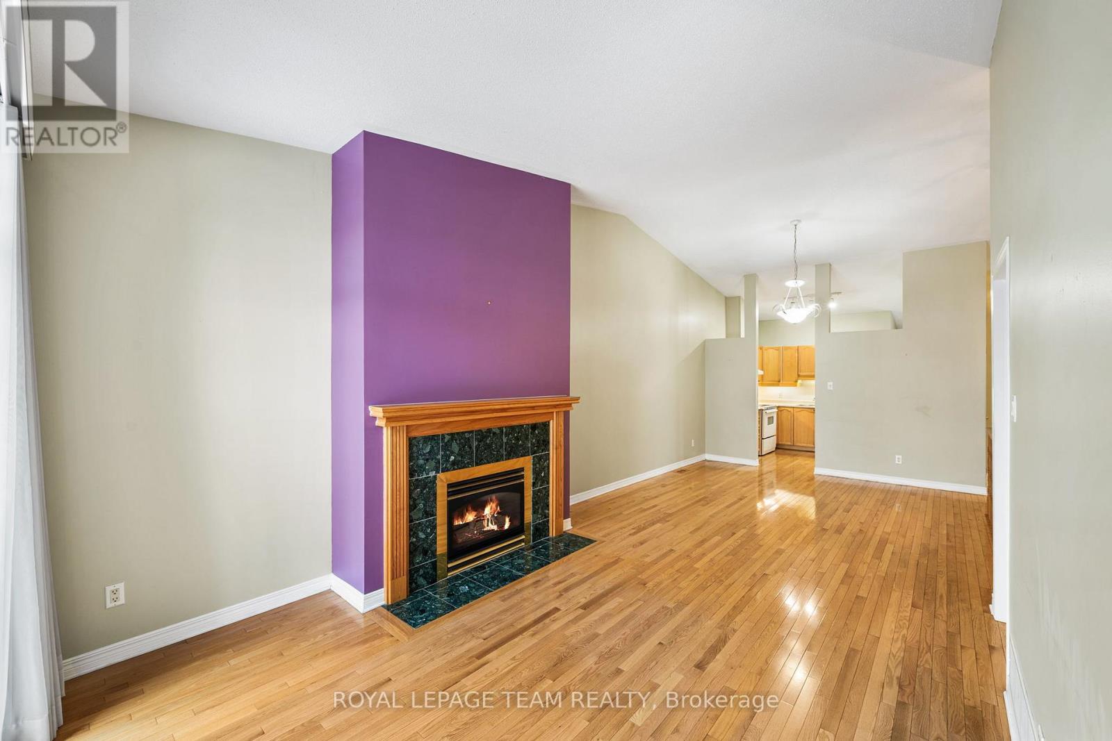 10 Quinterra Court, Ottawa, ON - Indoor Photo Showing Living Room With Fireplace