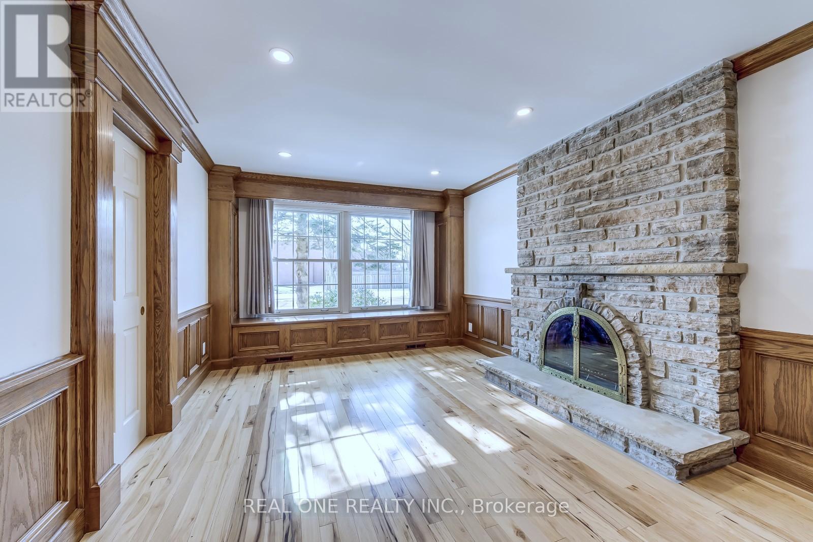 Family Room Sitting Area - 1585 Crombie Road, Mississauga, ON - Indoor With Fireplace