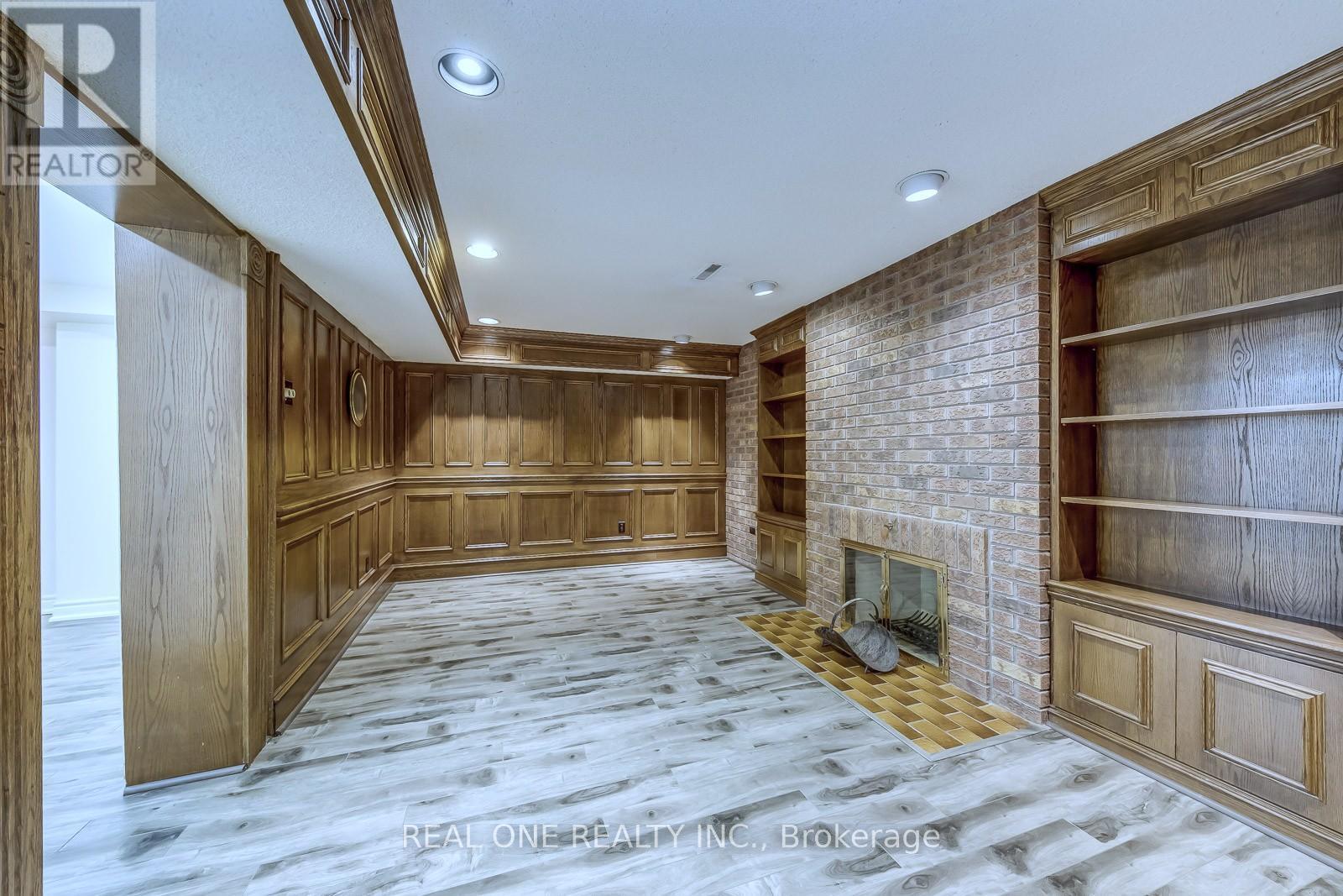 Lower Level Sitting Area - 1585 Crombie Road, Mississauga, ON - Indoor Photo Showing Other Room With Fireplace