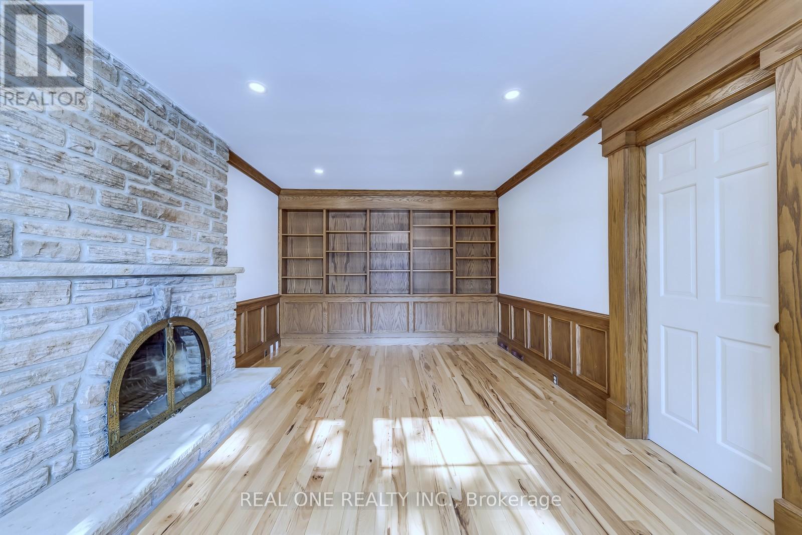 Family Room Reading Nook - 1585 Crombie Road, Mississauga, ON - Indoor Photo Showing Other Room With Fireplace