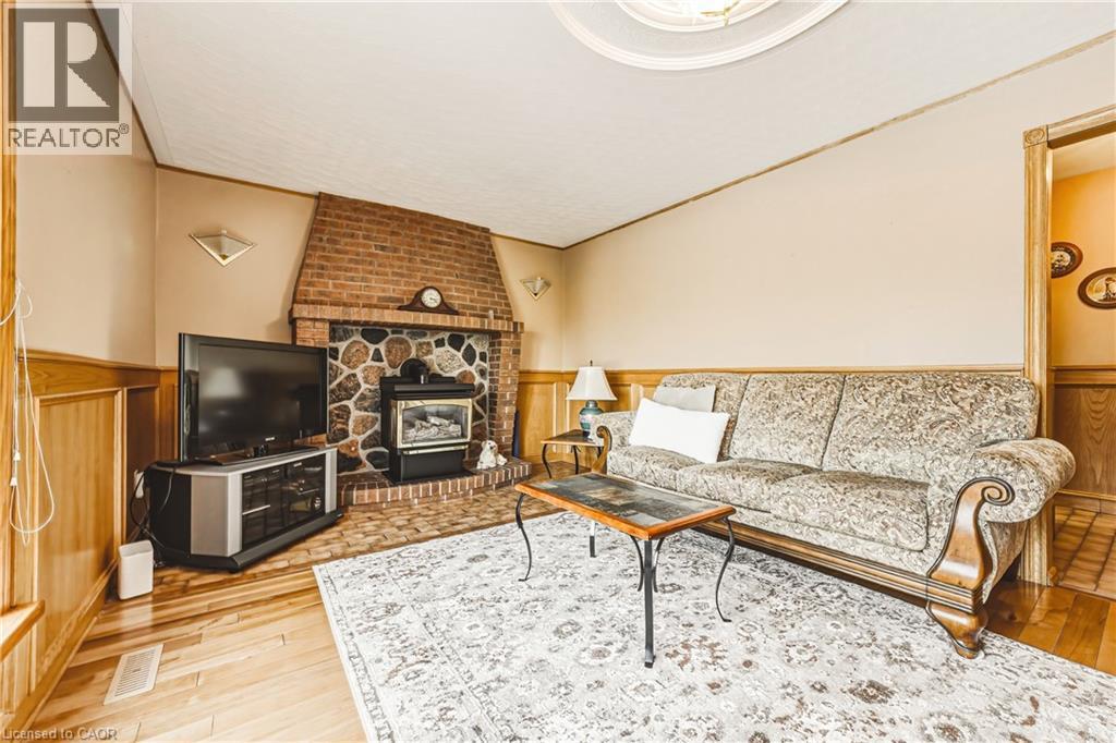 53 Glover Road, Hamilton, ON - Indoor Photo Showing Living Room With Fireplace