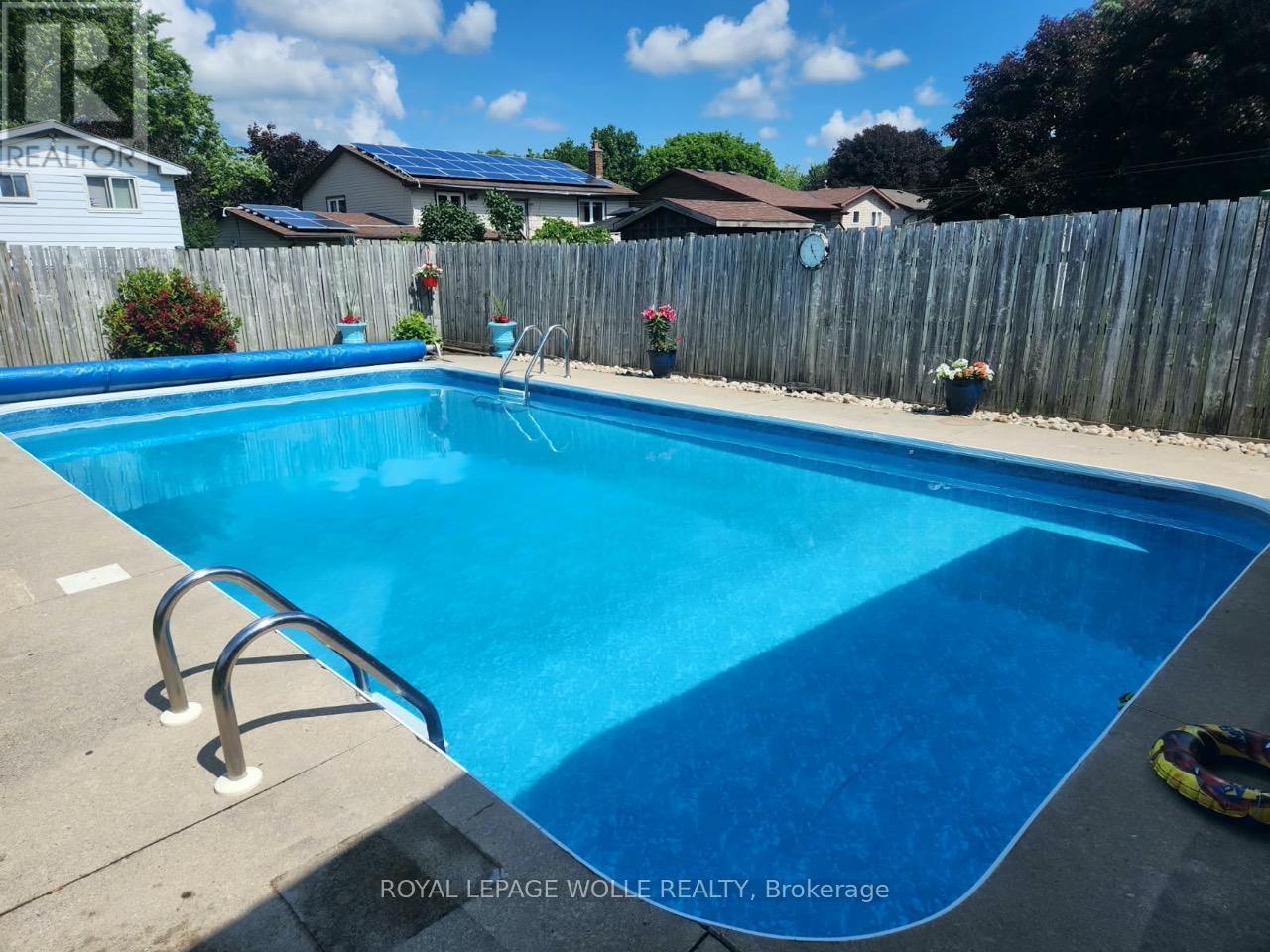 Pool - 218 Arris Crescent, West Perth, ON - Outdoor With In Ground Pool With Backyard