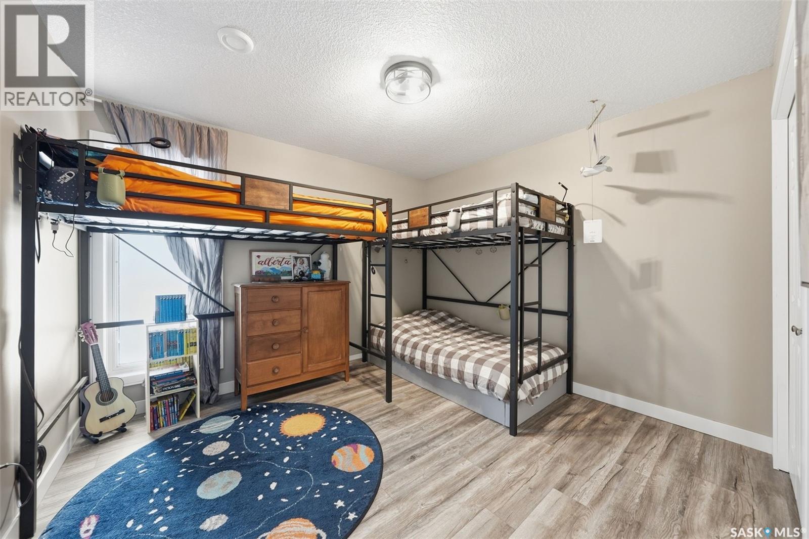 217 13Th Avenue E, Watrous, SK - Indoor Photo Showing Bedroom