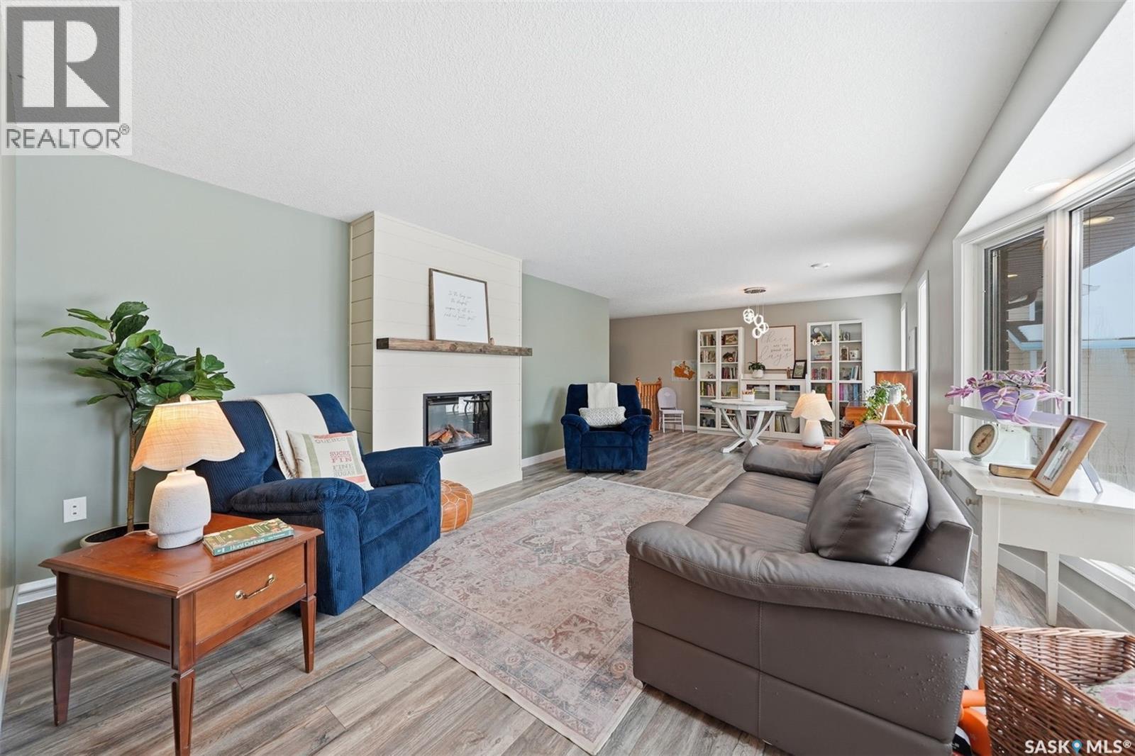 217 13Th Avenue E, Watrous, SK - Indoor Photo Showing Living Room With Fireplace