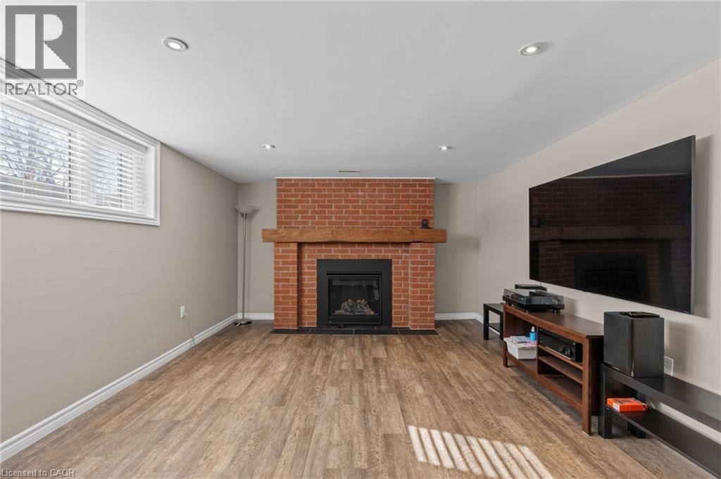 218 Arris Crescent, Mitchell, ON - Indoor Photo Showing Living Room With Fireplace