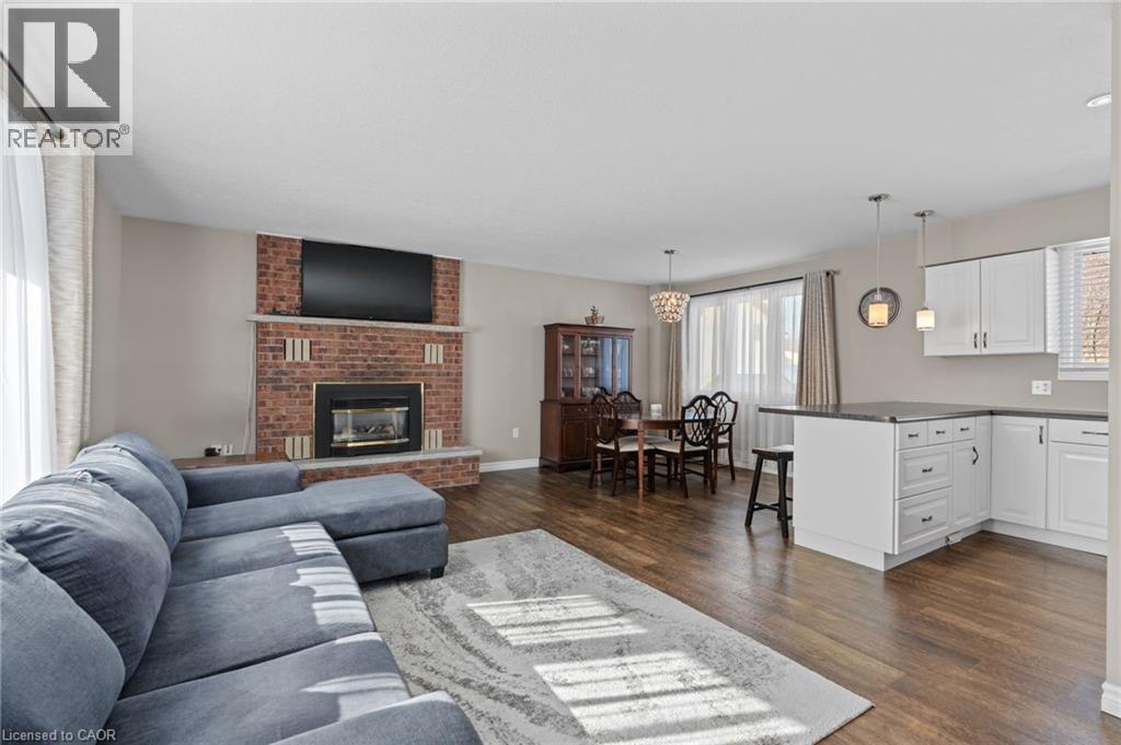 218 Arris Crescent, Mitchell, ON - Indoor Photo Showing Living Room With Fireplace