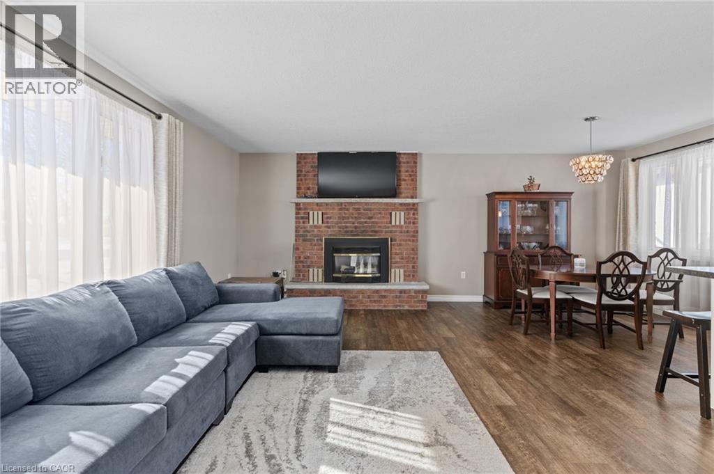218 Arris Crescent, Mitchell, ON - Indoor Photo Showing Living Room With Fireplace