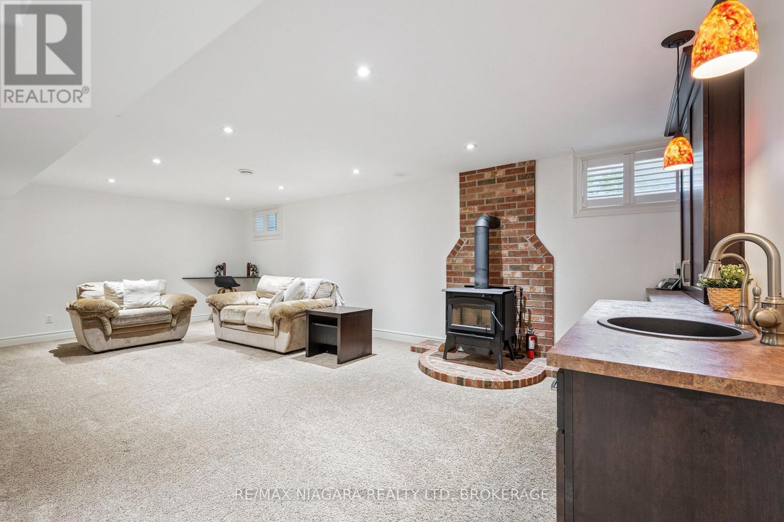 Cozy wood burning fireplace for cold winter nights - 2231 Seventh Street, St. Catharines (Rural Fourth), ON - Indoor With Fireplace