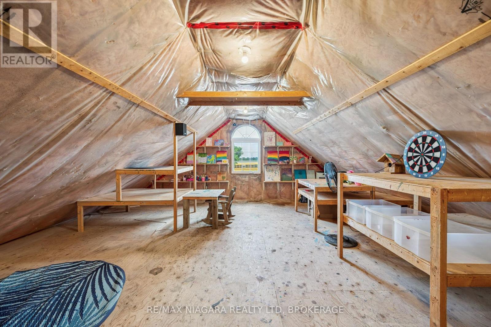Unfinished loft over det. garage (2 pc bath below) - 2231 Seventh Street, St. Catharines (Rural Fourth), ON - Indoor Photo Showing Other Room