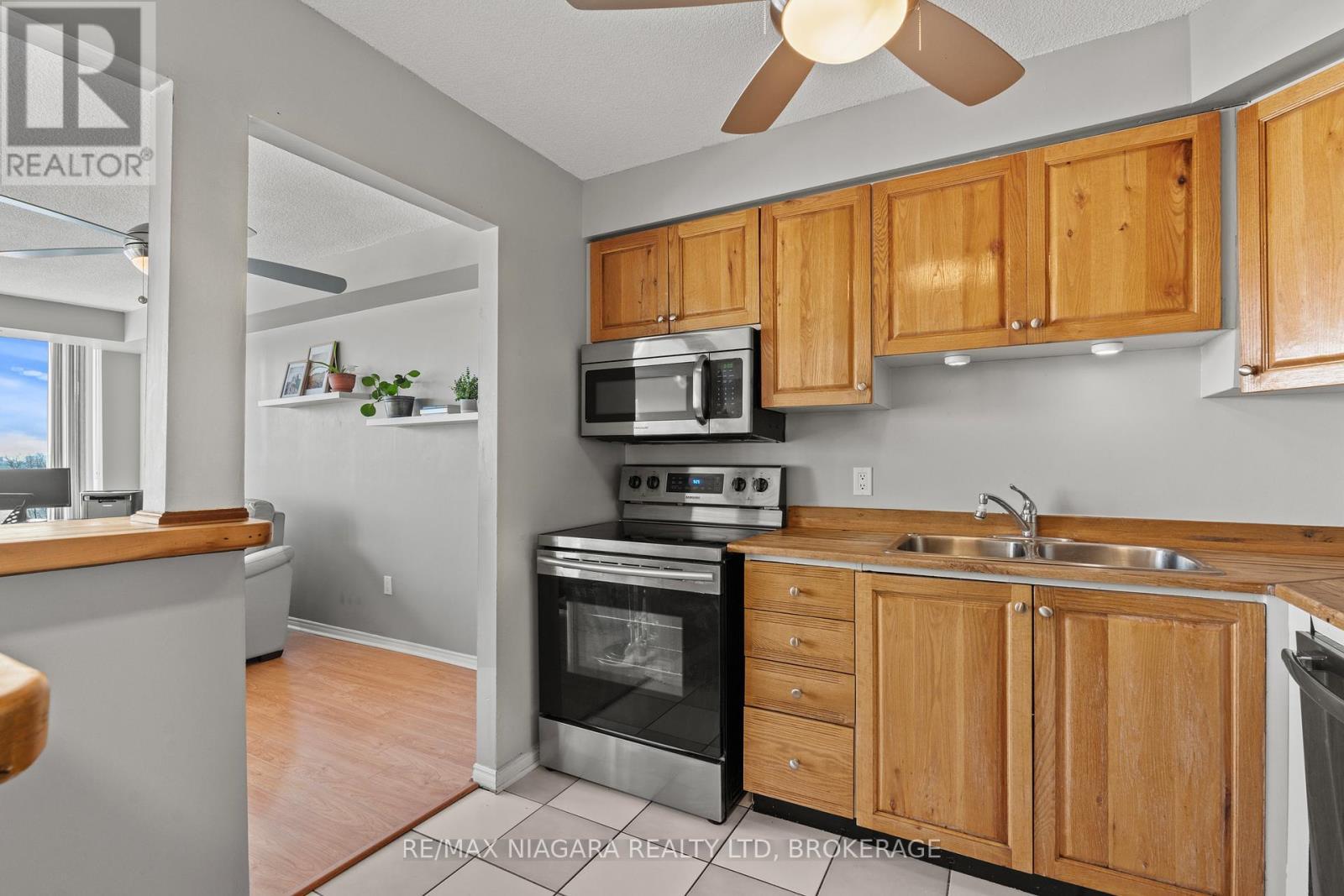 601 - 81 Scott Street, St. Catharines (Lakeport), ON - Indoor Photo Showing Kitchen With Double Sink