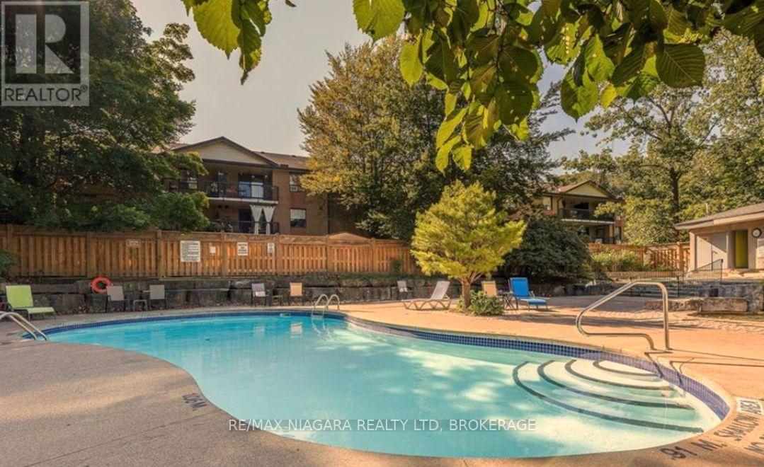 601 - 81 Scott Street, St. Catharines (Lakeport), ON - Outdoor With In Ground Pool With Backyard