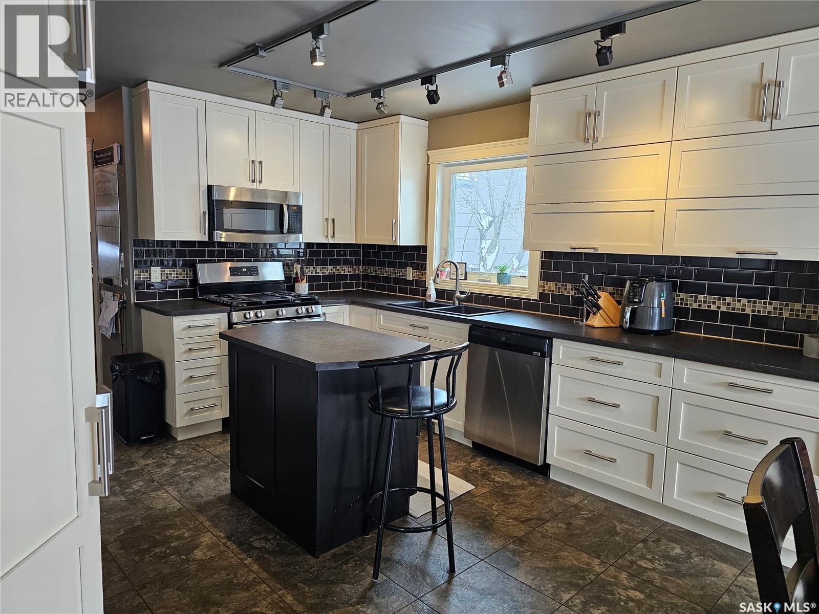26 Barnes Crescent, Humboldt, SK - Indoor Photo Showing Kitchen With Stainless Steel Kitchen With Double Sink