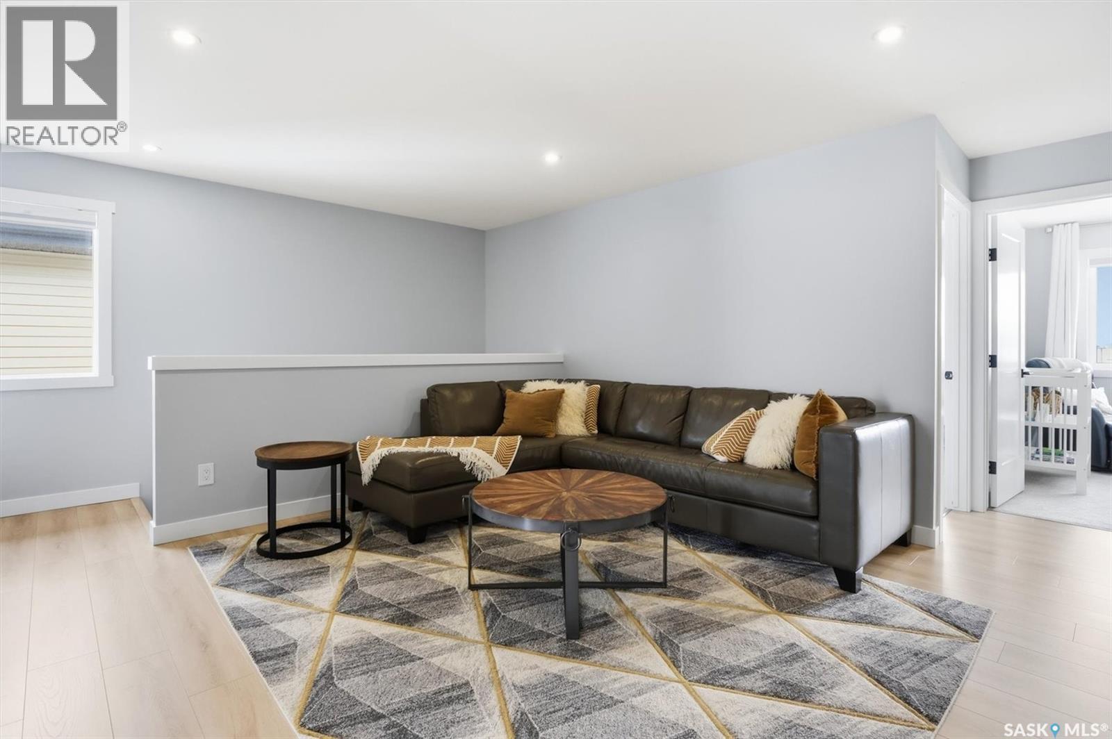 406 Chelsom Manor, Saskatoon, SK - Indoor Photo Showing Living Room