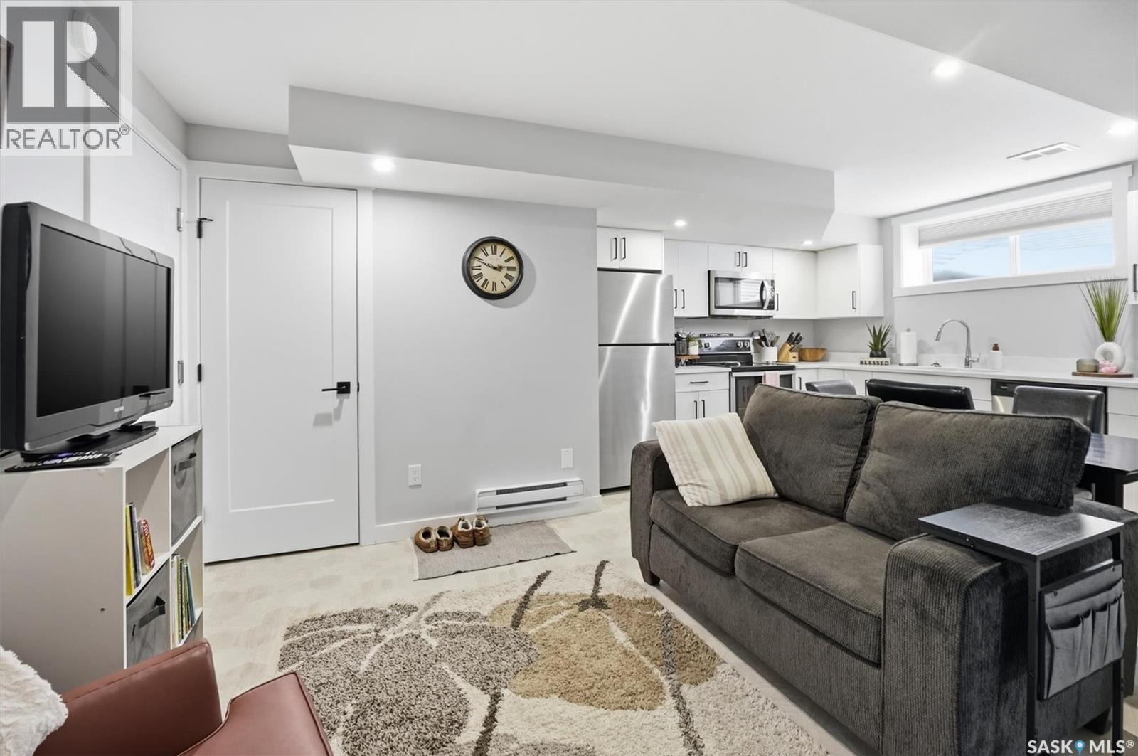 406 Chelsom Manor, Saskatoon, SK - Indoor Photo Showing Living Room