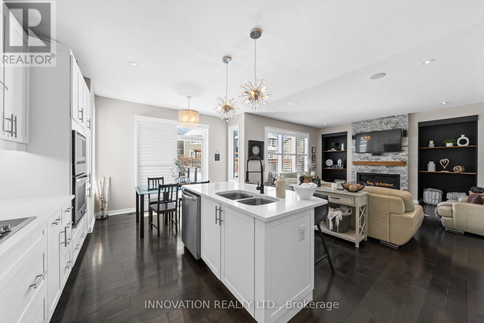 304 Eucalyptus Circle, Ottawa, ON - Indoor Photo Showing Kitchen With Fireplace With Stainless Steel Kitchen With Double Sink With Upgraded Kitchen