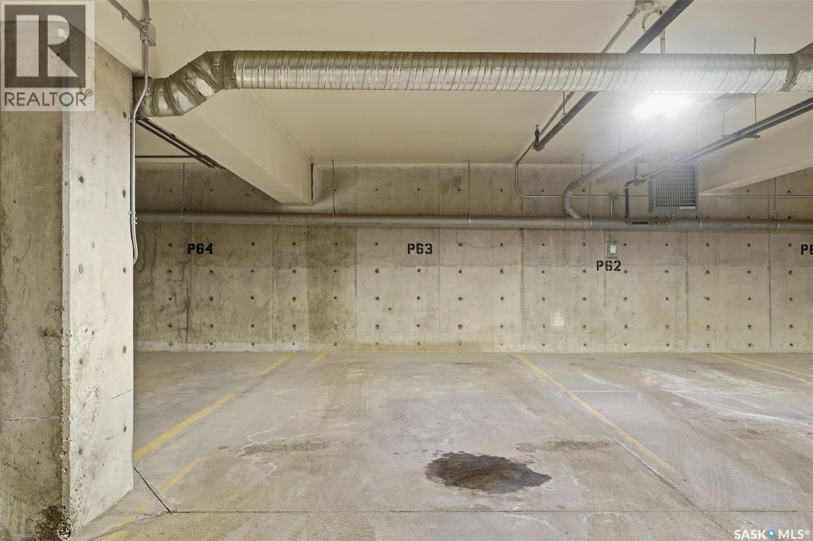 120 545 Hassard Close, Saskatoon, SK - Indoor Photo Showing Garage