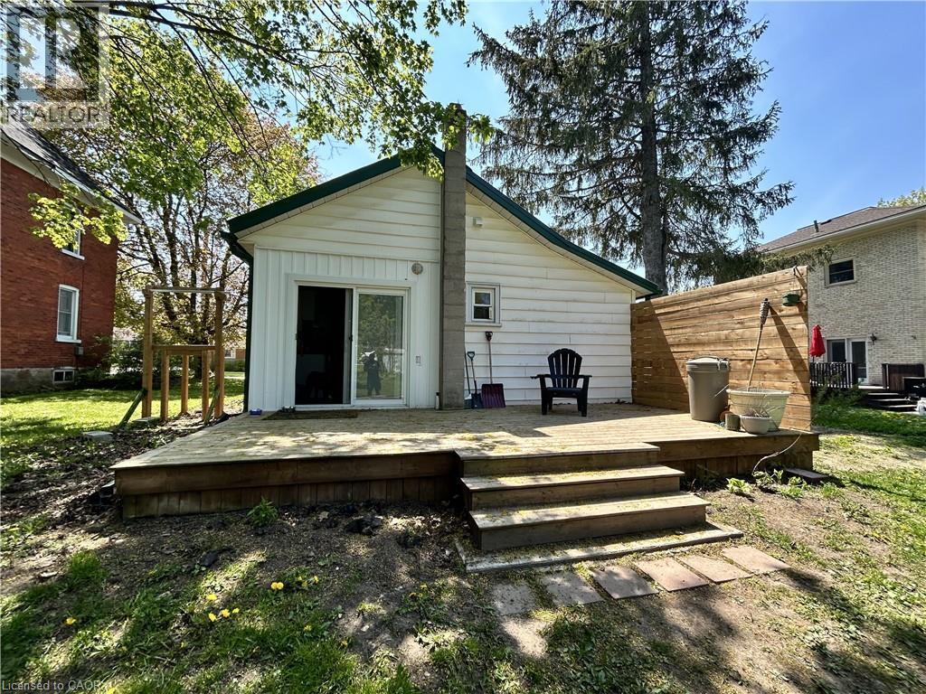 Rear wood deck with multiple levels and wood privacy screen - 101 John Street E, Wingham, ON - Outdoor With Deck Patio Veranda With Exterior