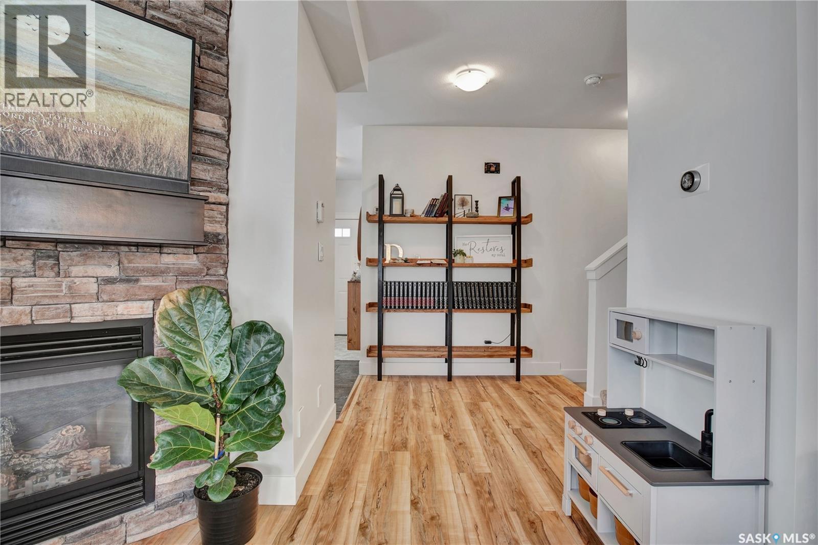 13 600 Maple Crescent, Warman, SK - Indoor With Fireplace