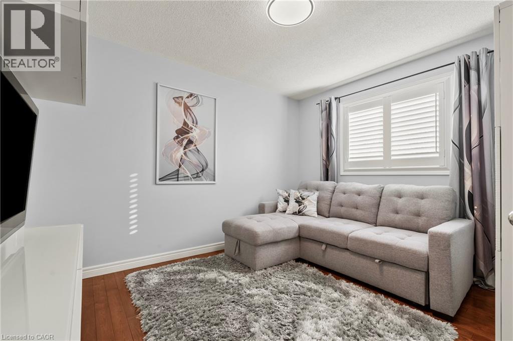 Bedroom currently used as sitting room - 42 Archer Way, Hamilton, ON - Indoor Photo Showing Living Room