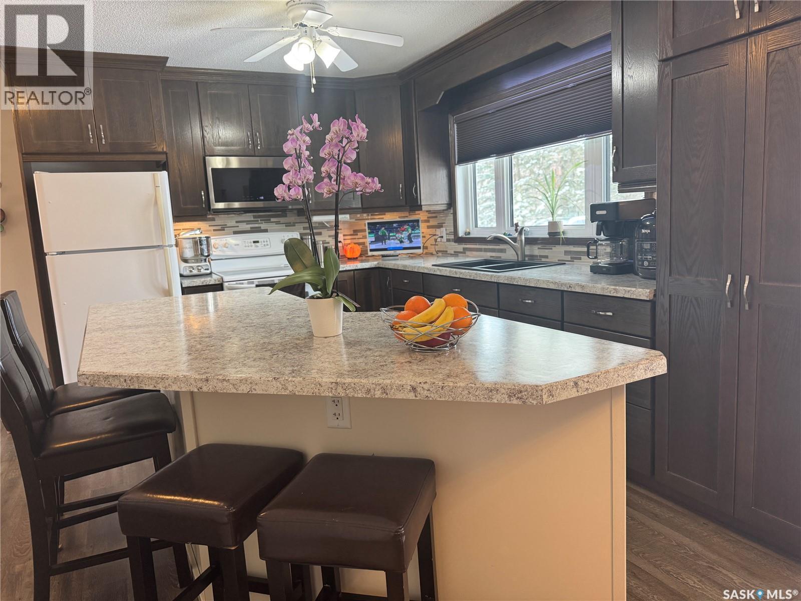 101 Doepker Avenue, Annaheim, SK - Indoor Photo Showing Kitchen With Double Sink