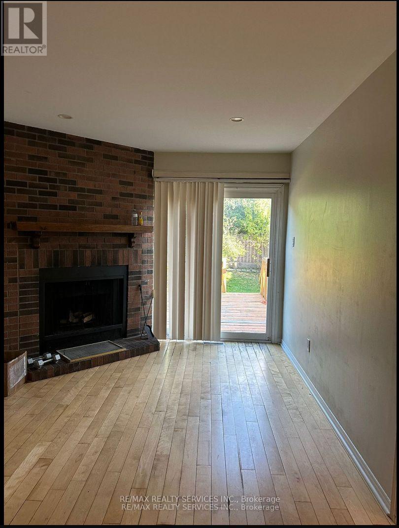 132 Cherrytree Drive, Brampton, ON - Indoor Photo Showing Living Room With Fireplace