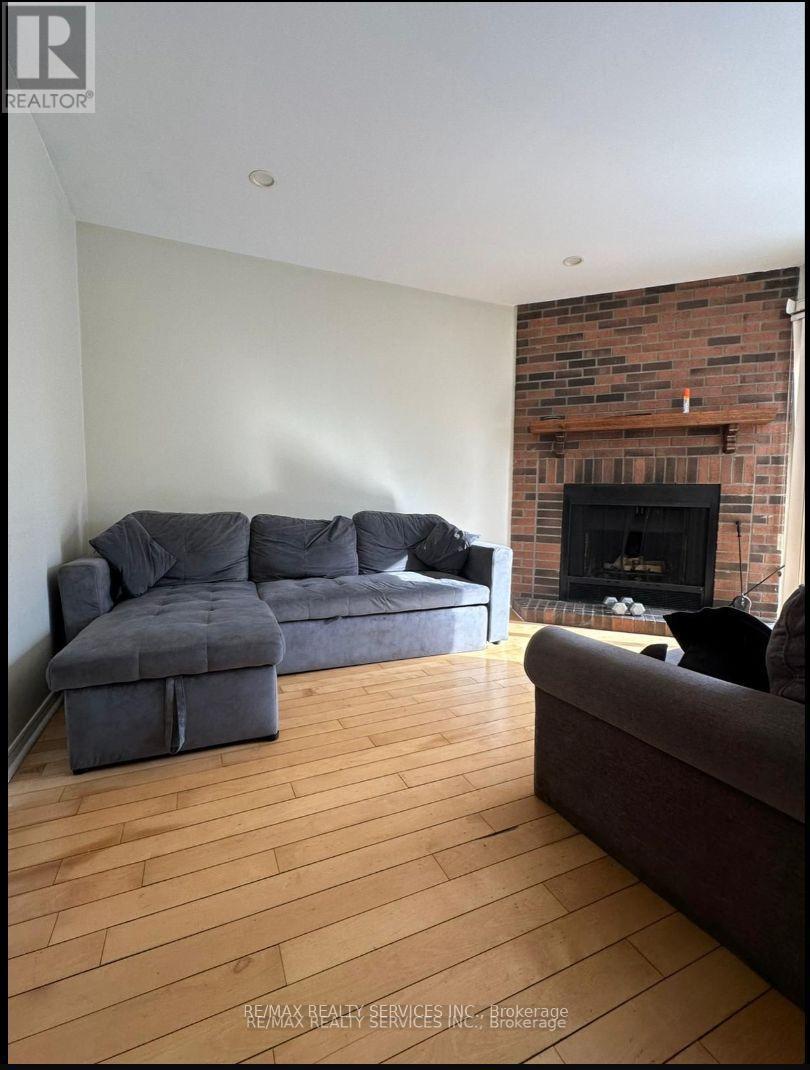 132 Cherrytree Drive, Brampton, ON - Indoor Photo Showing Living Room With Fireplace