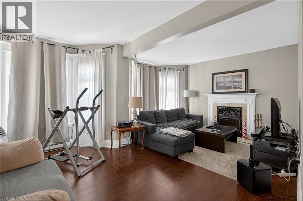 147 Homewood Avenue, Hamilton, ON - Indoor Photo Showing Living Room With Fireplace