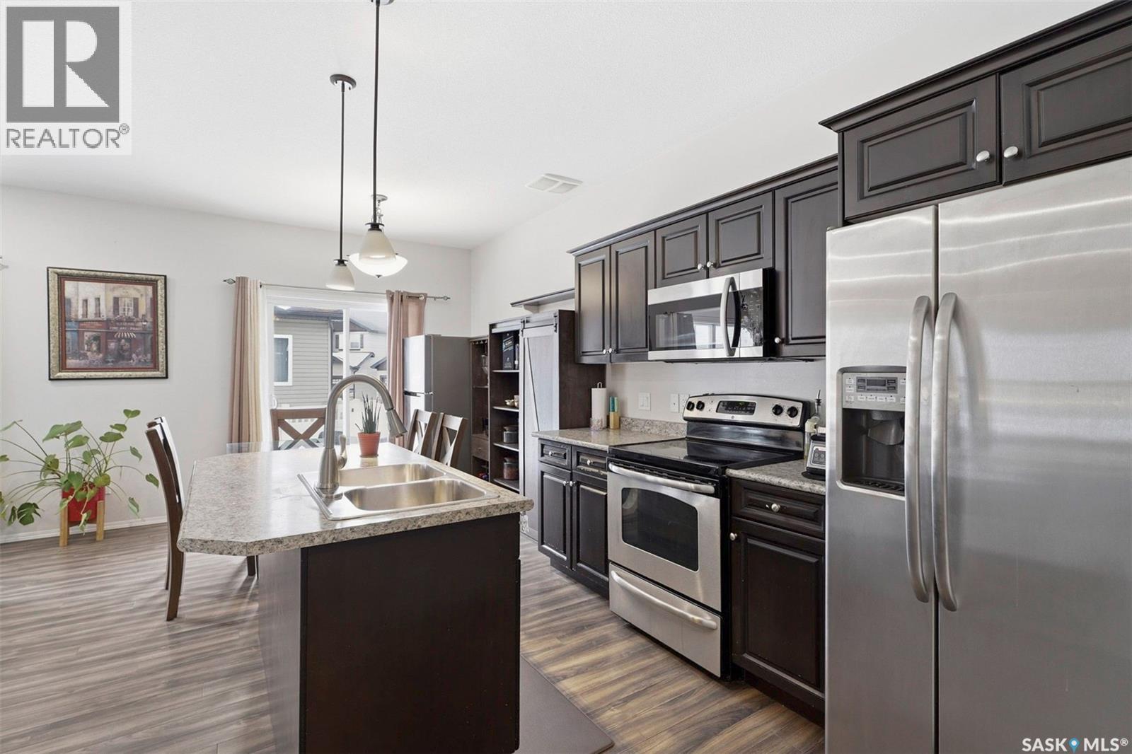 722 150 Langlois Way, Saskatoon, SK - Indoor Photo Showing Kitchen With Double Sink With Upgraded Kitchen