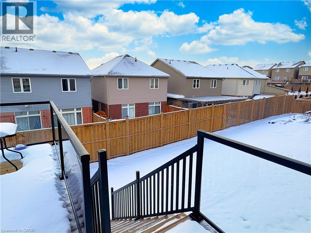 View of snow covered deck - 34 Watervale Drive Unit# Upper, Kitchener, ON - Outdoor