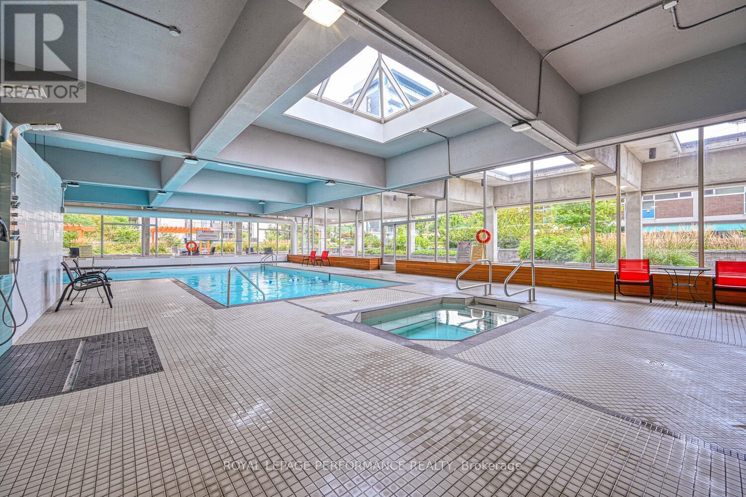 Pool and hot tub inside building. - 2502 - 530 Laurier Avenue W, Ottawa, ON - With In Ground Pool