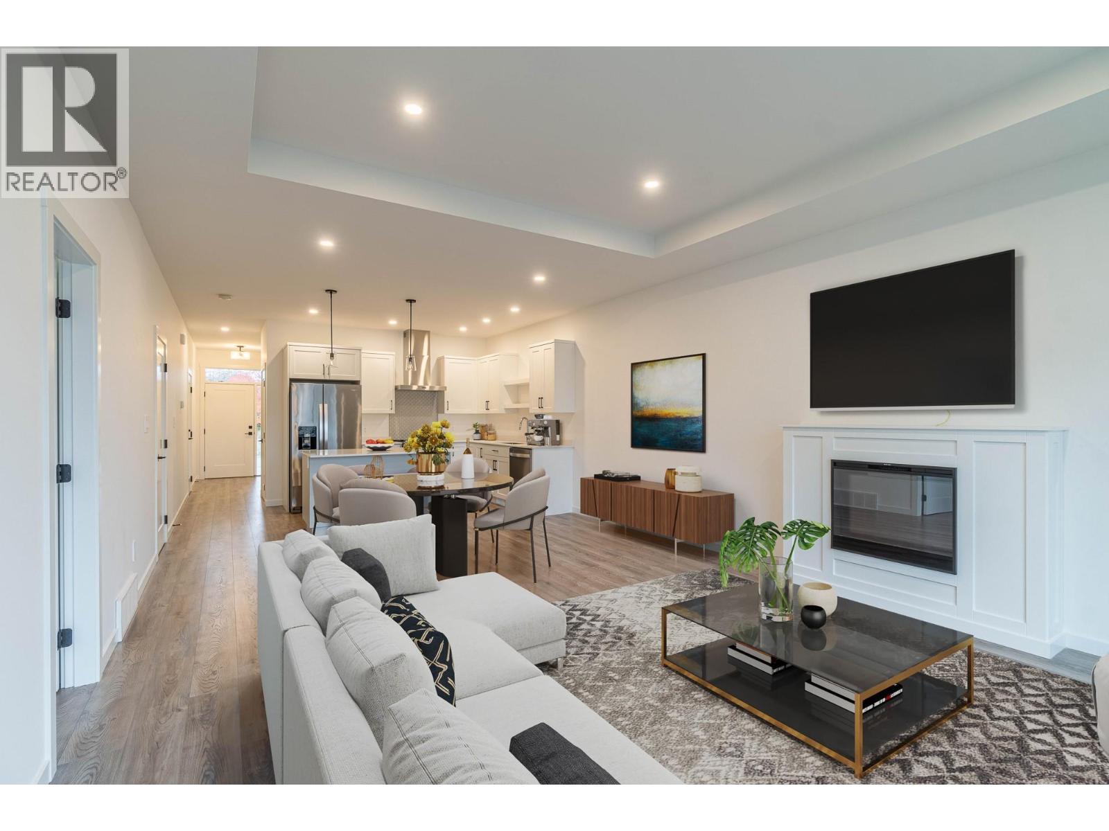 Digital Staging - Previous Finished Unit for Reference - 220 Shepherd Road Unit# 12, Chase, BC - Indoor Photo Showing Living Room With Fireplace