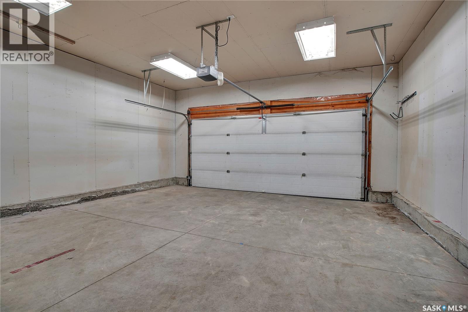 1131 Denham Rise, Saskatoon, SK - Indoor Photo Showing Garage
