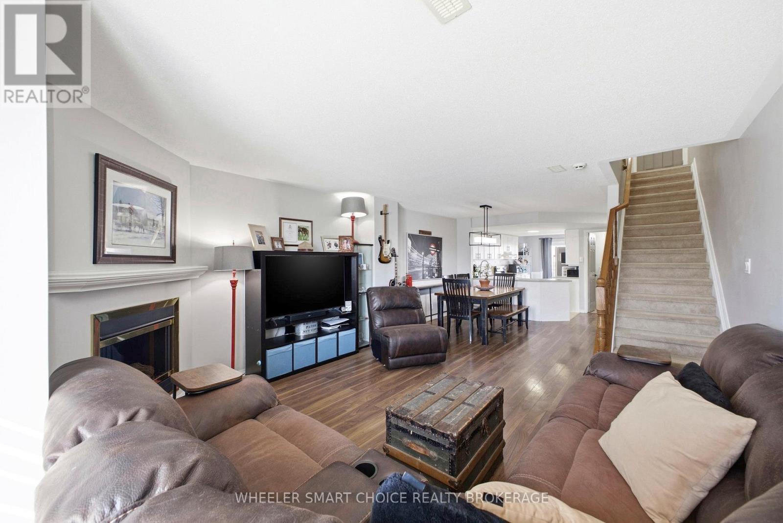 432 Hillsboro Private, Ottawa, ON - Indoor Photo Showing Living Room With Fireplace
