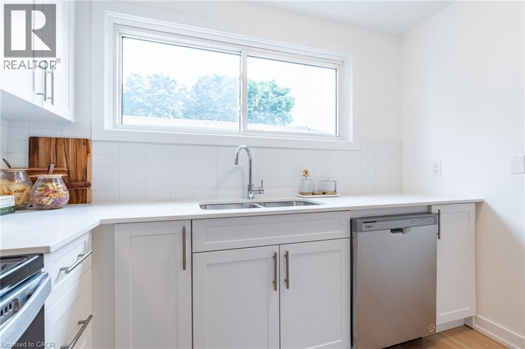 22 Woodman Drive N, Hamilton, ON - Indoor Photo Showing Kitchen With Double Sink