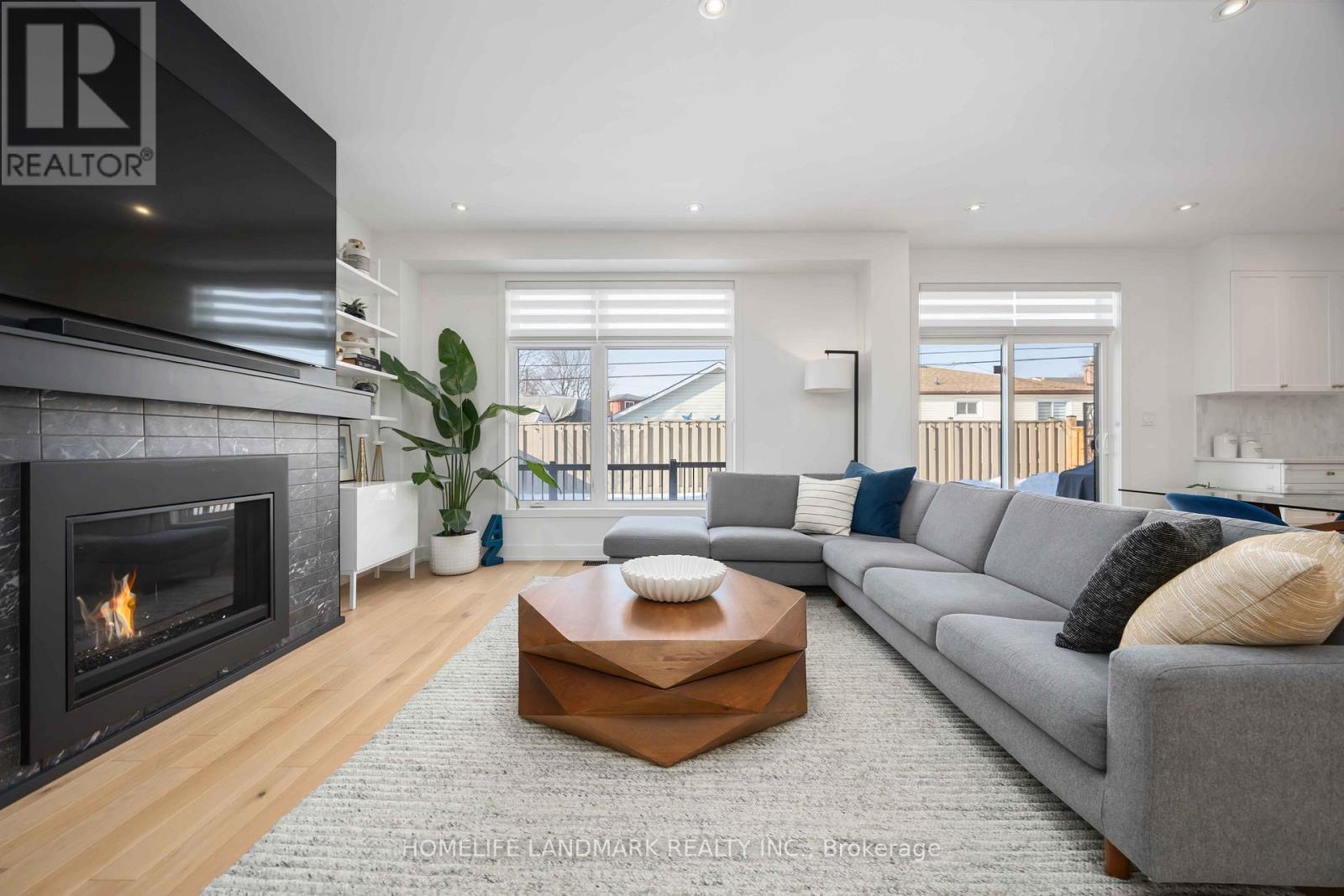 1330 Gull Crossing, Pickering, ON - Indoor Photo Showing Living Room With Fireplace
