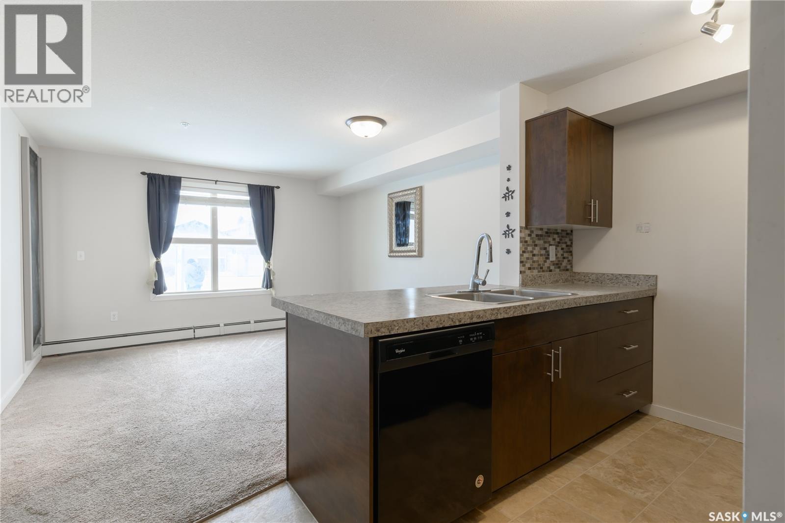 1121 5500 Mitchinson Way, Regina, SK - Indoor Photo Showing Kitchen With Double Sink