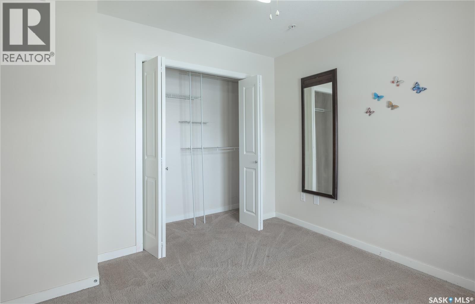 1121 5500 Mitchinson Way, Regina, SK - Indoor Photo Showing Other Room