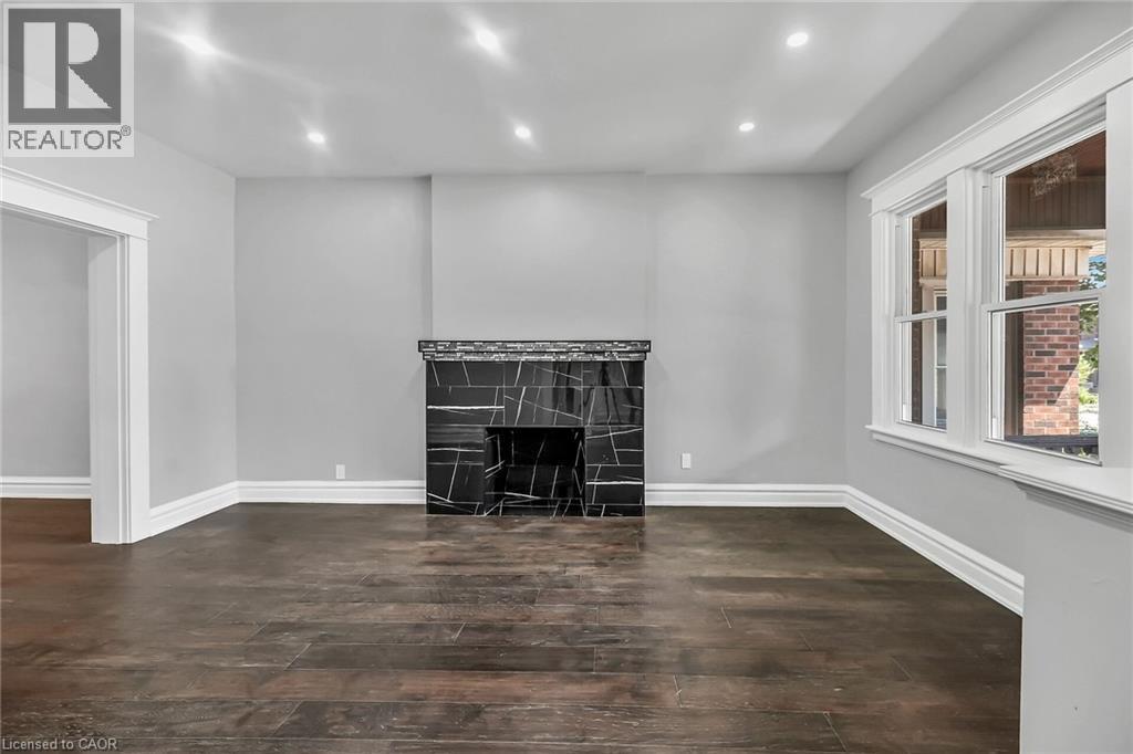 172 Sherman Avenue S, Hamilton, ON - Indoor With Fireplace