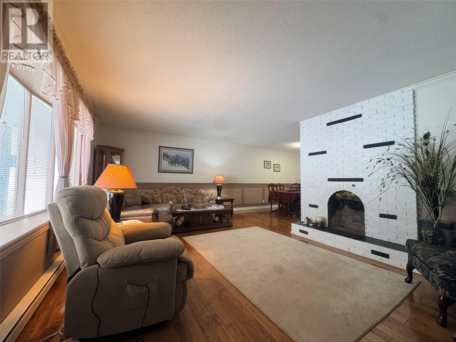 12 Chippys Lane, Appleton, NL - Indoor Photo Showing Other Room With Fireplace