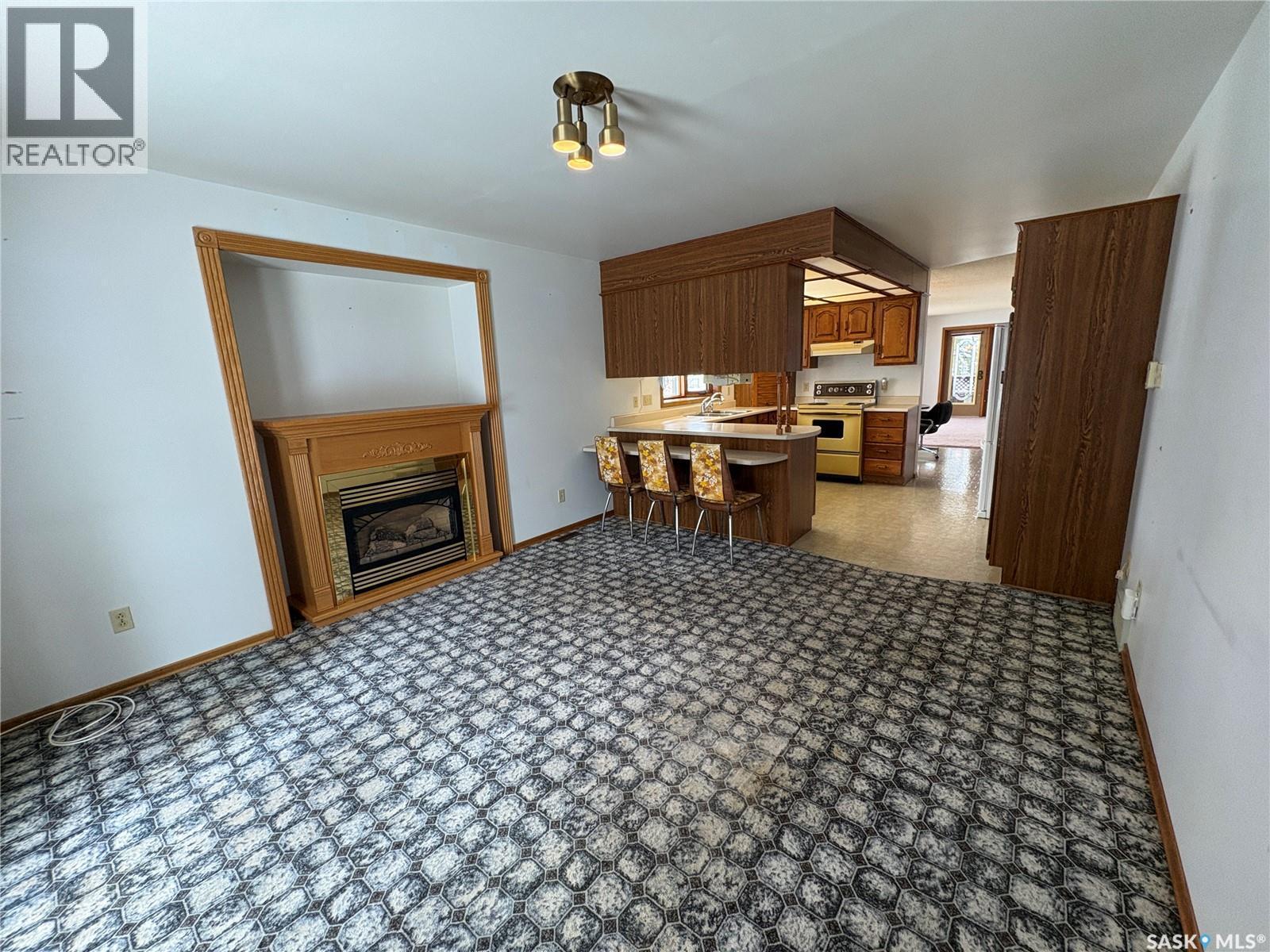 505 March Avenue E, Langenburg, SK - Indoor With Fireplace