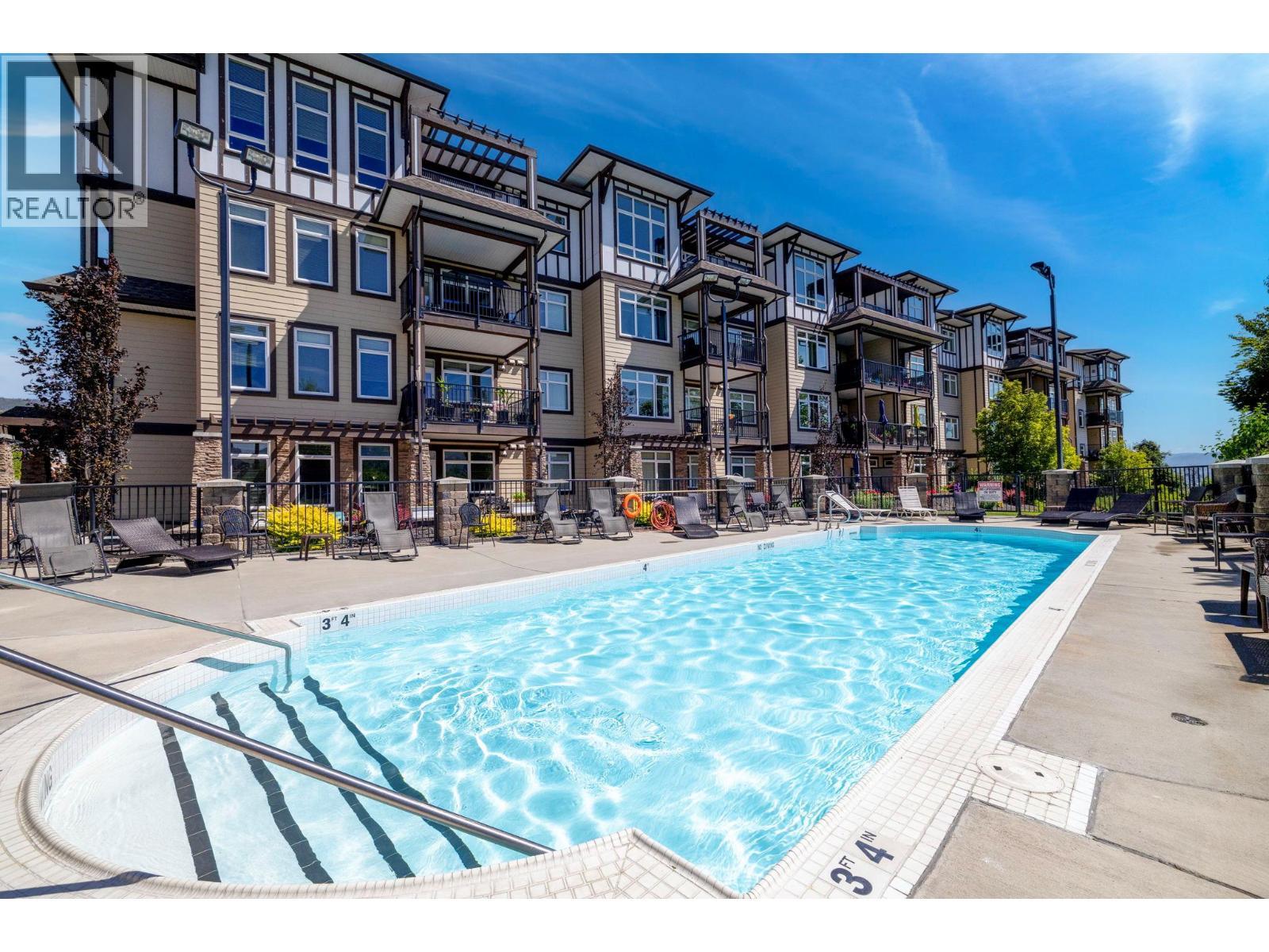 3832 Old Okanagan Highway Unit# 3105, West Kelowna, BC - Outdoor With In Ground Pool With Facade