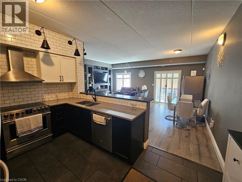 308 Watson Parkway N Unit# 102, Guelph, ON - Indoor Photo Showing Kitchen With Stainless Steel Kitchen