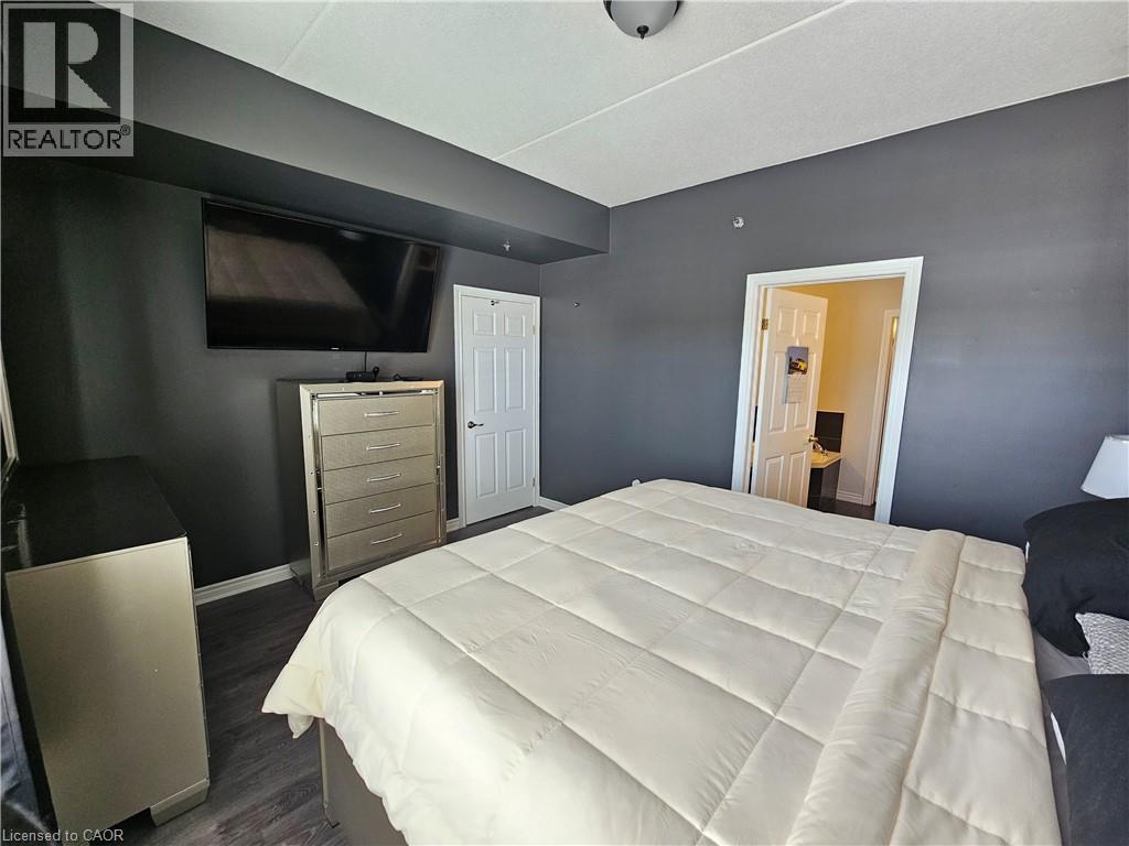 Entertainment area with b/i electric fireplace - 308 Watson Parkway N Unit# 102, Guelph, ON - Indoor With Fireplace