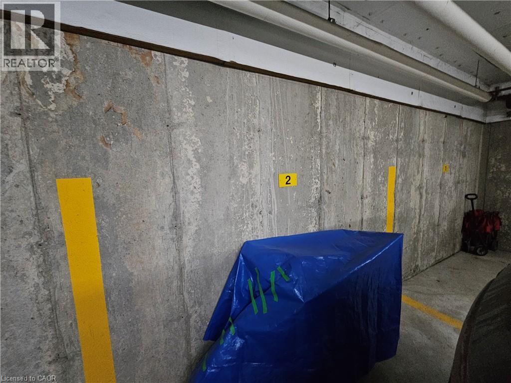 308 Watson Parkway N Unit# 102, Guelph, ON - Indoor Photo Showing Garage