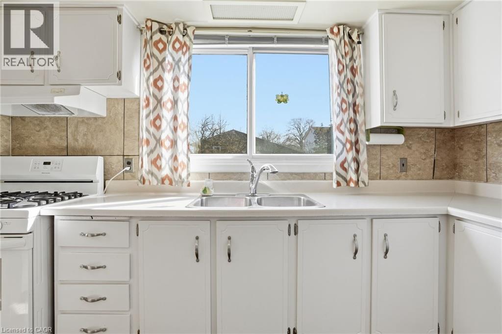 55 Champlain Avenue, Hamilton, ON - Indoor Photo Showing Kitchen With Double Sink