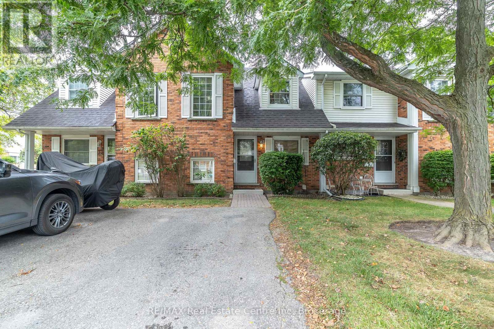 74 - 129 Victoria Road N, Guelph (Grange Road), ON - Outdoor With Facade