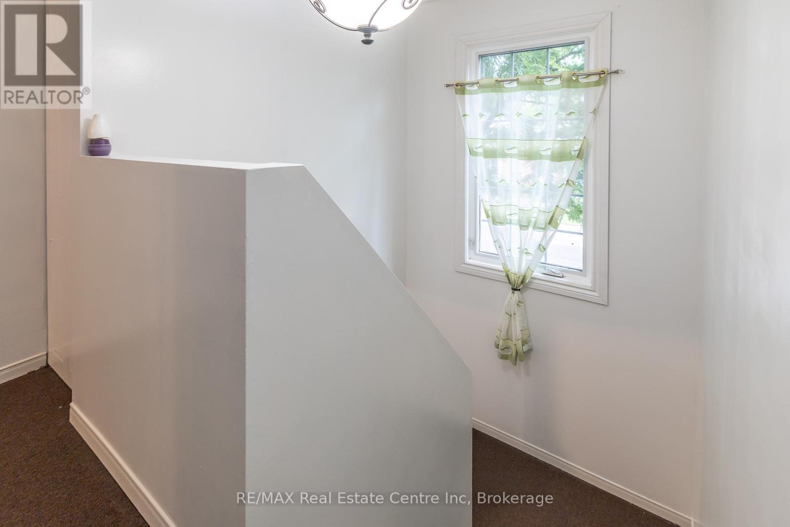 74 - 129 Victoria Road N, Guelph (Grange Road), ON - Indoor Photo Showing Other Room
